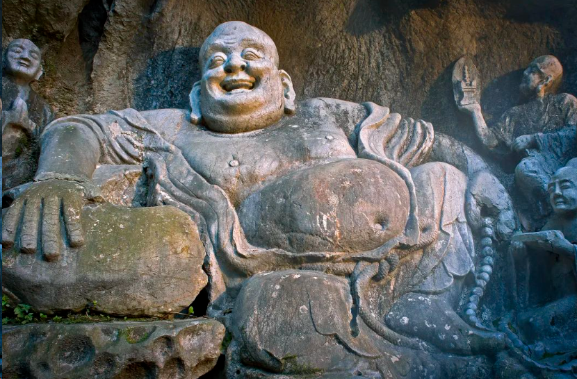 Budia monk carved in stone, laughing