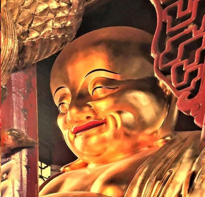 Budia monk in the temple with a smile.