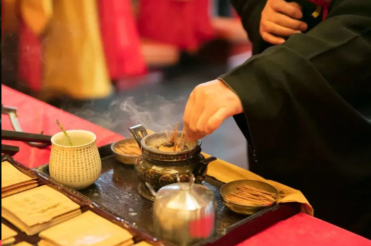 Burning incense in temple