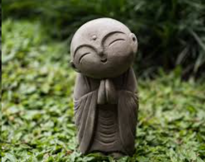 small stone jizo buddha statue